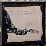 C37. Signed Eric Clapton album. 